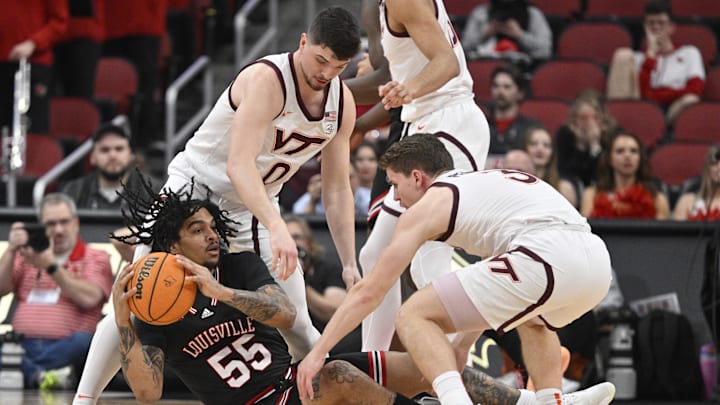 Mar 5, 2024; Louisville, Kentucky, USA; Louisville Cardinals guard Skyy Clark (55) looks to pass