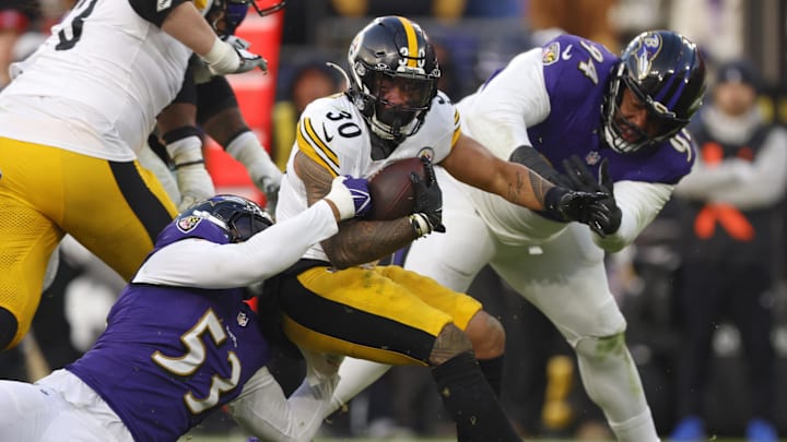 Dec 7, 2025; Baltimore, Maryland, USA; Baltimore Ravens linebacker Kyle van Noy (53) tackles Pittsburgh Steelers running back Dec 7, 2025; Baltimore, Maryland, USA; Baltimore Ravens linebacker Kyle van Noy (53) tackles Pittsburgh Steelers running back