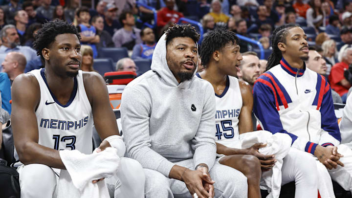 Mar 10, 2024; Oklahoma City, Oklahoma, USA; Memphis Grizzlies forward Jaren Jackson Jr. (13), guard Marcus Smart (36), forward GG Jackson (45) and guard Ja Morant (12) watch their team play against the Oklahoma City Thunder from the bench during the second half at Paycom Center. Mandatory Credit: Alonzo Adams-Imagn Images