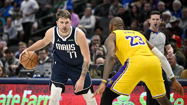 Dec 12, 2023; Dallas, Texas, USA; Dallas Mavericks guard Luka Doncic (77) and Los Angeles Lakers forward LeBron James (23) in action during the game between the Dallas Mavericks and the Los Angeles Lakers at the American Airlines Center. Mandatory Credit: Jerome Miron-Imagn Images