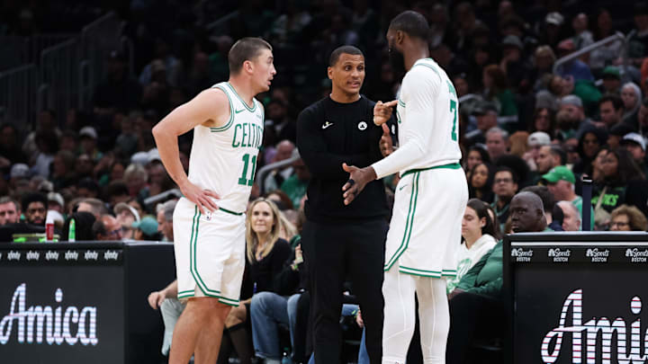 Oct 15, 2025; Boston, Massachusetts, USA; Boston Celtics head coach Joe Mazzulla talks with Boston Celtics guard Payton Pritchard (11) and Boston Celtics forward Jaylen Brown (7) during the first half against the Toronto Raptors at TD Garden. Mandatory Credit: Paul Rutherford-Imagn Images Oct 15, 2025; Boston, Massachusetts, USA; Boston Celtics head coach Joe Mazzulla talks with Boston Celtics guard Payton Pritchard (11) and Boston Celtics forward Jaylen Brown (7) during the first half against the Toronto Raptors at TD Garden. Mandatory Credit: Paul Rutherford-Imagn Images