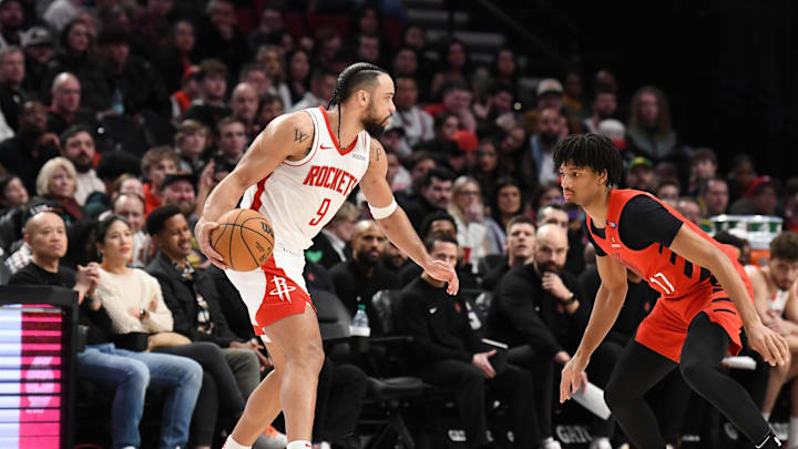 Jan 18, 2025; Portland, Oregon, USA;  Houston Rockets forward Dillon Brooks (9) brings the ball forward against Portland Trail Blazers guard Shaedon Sharpe (17) during the second half at Moda Center. Mandatory Credit: Brian Murphy-Imagn Images