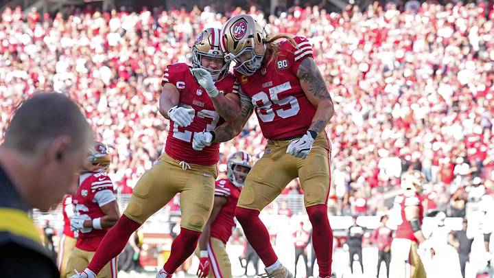 San Francisco 49ers tight end George Kittle (85) celebrates with running back Christian McCaffrey. San Francisco 49ers tight end George Kittle (85) celebrates with running back Christian McCaffrey.
