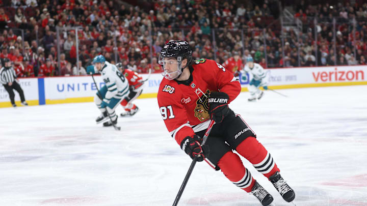 Feb 2, 2026; Chicago, Illinois, USA; Chicago Blackhawks center Frank Nazar (91) skates with the puck during the first period against the San Jose Sharks at United Center. Mandatory Credit: Talia Sprague-Imagn Images