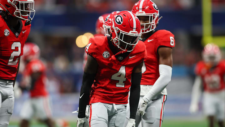 Aug 31, 2024; Atlanta, Georgia, USA; Georgia Bulldogs defensive back KJ Bolden (4) reacts after a tackle against the Clemson Tigers in the first quarter at Mercedes-Benz Stadium. Mandatory Credit: Brett Davis-Imagn Images Aug 31, 2024; Atlanta, Georgia, USA; Georgia Bulldogs defensive back KJ Bolden (4) reacts after a tackle against the Clemson Tigers in the first quarter at Mercedes-Benz Stadium. Mandatory Credit: Brett Davis-Imagn Images