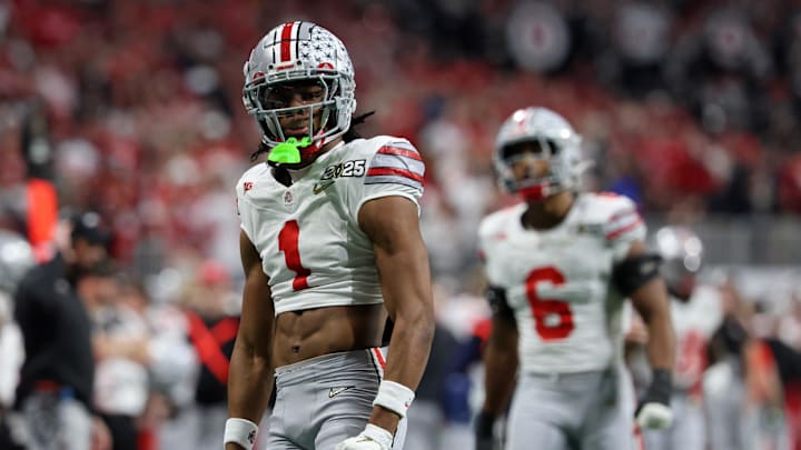 Jan 20, 2025; Atlanta, GA, USA; Ohio State Buckeyes cornerback Davison Igbinosun (1) reacts after a play against the Notre Dame Fighting Irish during the first half the CFP National Championship college football game at Mercedes-Benz Stadium. Mandatory Credit: Brett Davis-Imagn Images