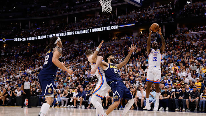 May 11, 2025; Denver, Colorado, USA; Oklahoma City Thunder guard Cason Wallace (22) grabs a rebound as Denver Nuggets guard Jamal Murray (27) is tied up with center Isaiah Hartenstein (55) as forward Aaron Gordon (32) defends in the second quarter during game four of the second round of the 2025 NBA Playoffs at Ball Arena. Mandatory Credit: Isaiah J. Downing-Imagn Images May 11, 2025; Denver, Colorado, USA; Oklahoma City Thunder guard Cason Wallace (22) grabs a rebound as Denver Nuggets guard Jamal Murray (27) is tied up with center Isaiah Hartenstein (55) as forward Aaron Gordon (32) defends in the second quarter during game four of the second round of the 2025 NBA Playoffs at Ball Arena. Mandatory Credit: Isaiah J. Downing-Imagn Images