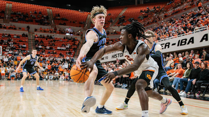 Richie Saunders deflects a pass from OK State's Small