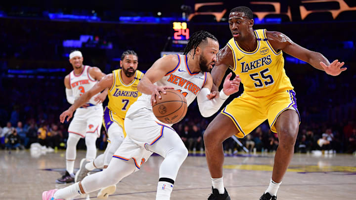 Mar 6, 2025; Los Angeles, California, USA; New York Knicks guard Jalen Brunson (11) moves to the basket against Los Angeles Lakers center Trey Jemison III (55) during the first half at Crypto.com Arena. Mandatory Credit: Gary A. Vasquez-Imagn Images