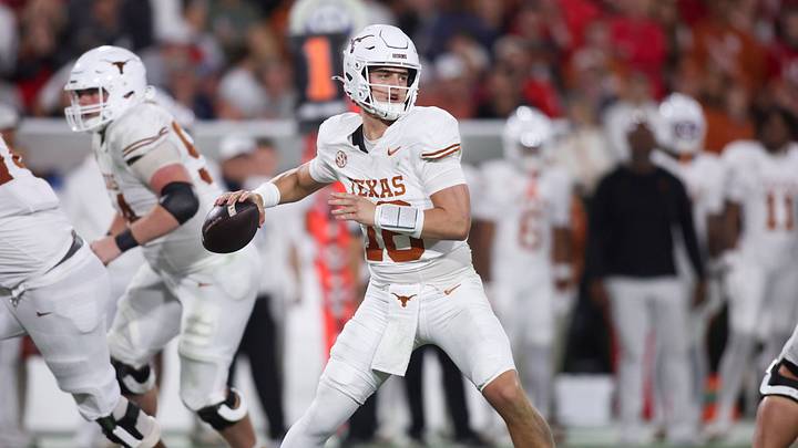 Texas Longhorns quarterback Arch Manning looks to pass.