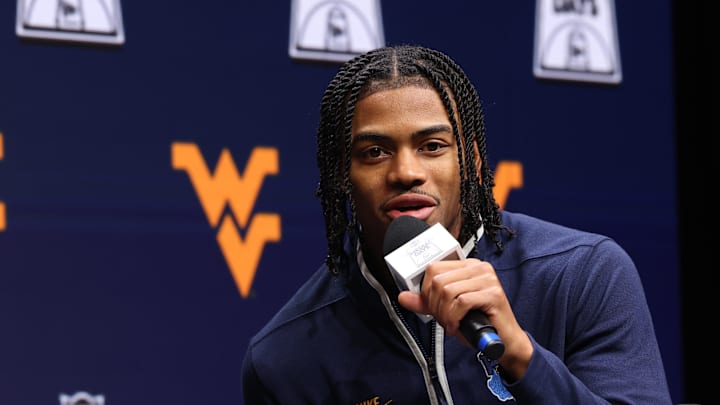 Oct 22, 2025; Kansas City, MO, USA; West Virginias Jasper Floyd speaks to media during Big 12 Menís Basketball media day at T-Mobile Center. Mandatory Credit: Sophia Scheller-Imagn Images Oct 22, 2025; Kansas City, MO, USA; West Virginias Jasper Floyd speaks to media during Big 12 Menís Basketball media day at T-Mobile Center. Mandatory Credit: Sophia Scheller-Imagn Images