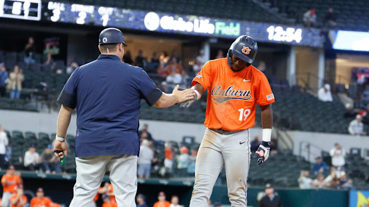 Feb 22, 2026; Arlington, TX, USA; Louisville vs Auburn during the Amegy Bank College Baseball Series at Globe Life Field. Mandatory Credit: Chris Jones-Imagn Images Feb 22, 2026; Arlington, TX, USA; Louisville vs Auburn during the Amegy Bank College Baseball Series at Globe Life Field. Mandatory Credit: Chris Jones-Imagn Images