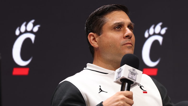 Oct 22, 2025; Kansas City, MO, USA; Cincinnati head coach Wes Miller speaks to media during Big 12 media day at T-Mobile Center. Mandatory Credit: Sophia Scheller-Imagn Images Oct 22, 2025; Kansas City, MO, USA; Cincinnati head coach Wes Miller speaks to media during Big 12 media day at T-Mobile Center. Mandatory Credit: Sophia Scheller-Imagn Images