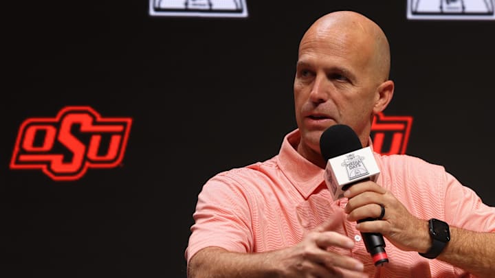 Oct 22, 2025; Kansas City, MO, USA; Oklahoma State head coach Steve Lutz speaks to media during Big 12  Menís Basketball media day at T-Mobile Center. Mandatory Credit: Sophia Scheller-Imagn Images
