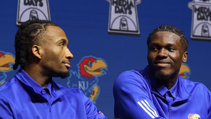 Oct 22, 2025; Kansas City, MO, USA; Kansas guard Darryn Peterson and forward Flory Bidunga react during Big 12 Menís Basketball media day at T-Mobile Center. 