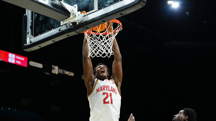 Nov 24, 2025; Las Vegas, Nevada, USA; Maryland Terrapins forward Pharrel Payne (21) shoots against UNLV Rebels forward Kimani Hamilton (2) during the first half in a 2025 Players Era Festival group play game at MGM Grand Garden Arena. Mandatory Credit: Stephen R. Sylvanie-Imagn Images