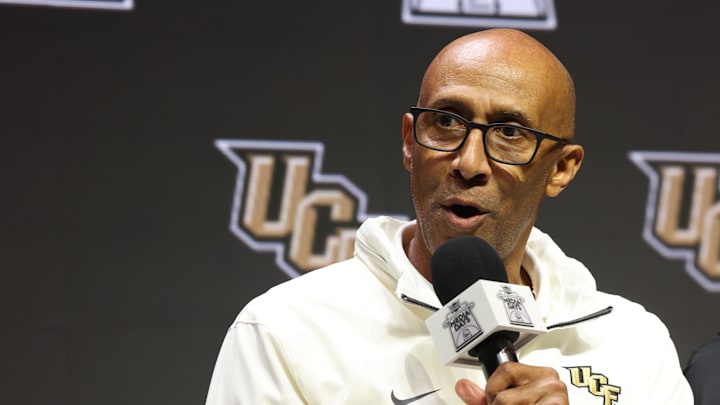 Oct 22, 2025; Kansas City, MO, USA; UCF head coach Johnny Dawkins speaks to media during Big 12 Menís Basketball media day at T-Mobile Center. Mandatory Credit: Sophia Scheller-Imagn Images Oct 22, 2025; Kansas City, MO, USA; UCF head coach Johnny Dawkins speaks to media during Big 12 Menís Basketball media day at T-Mobile Center. Mandatory Credit: Sophia Scheller-Imagn Images