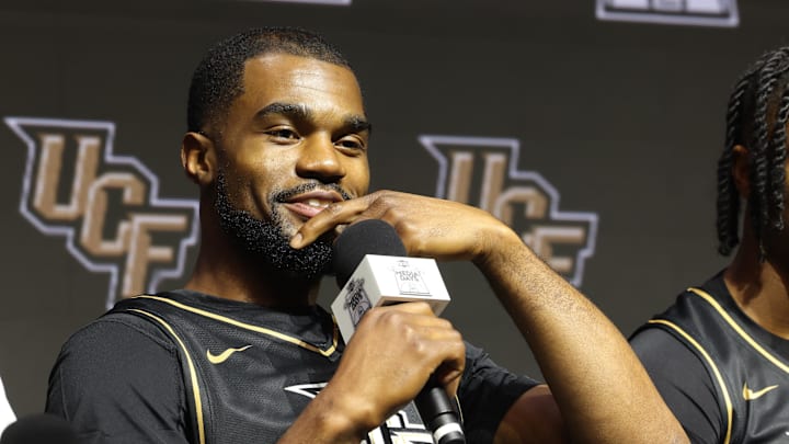 Oct 22, 2025; Kansas City, MO, USA; UCFs Devan Cambridge speaks to media during Big 12 Menís Basketball media day at T-Mobile Center. Mandatory Credit: Sophia Scheller-Imagn Images