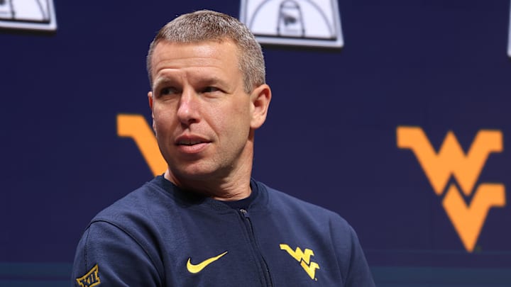 Oct 22, 2025; Kansas City, MO, USA; West Virginia head coach Ross Hodge speaks to media during Big 12 Menís Basketball media day at T-Mobile Center. Mandatory Credit: Sophia Scheller-Imagn Images