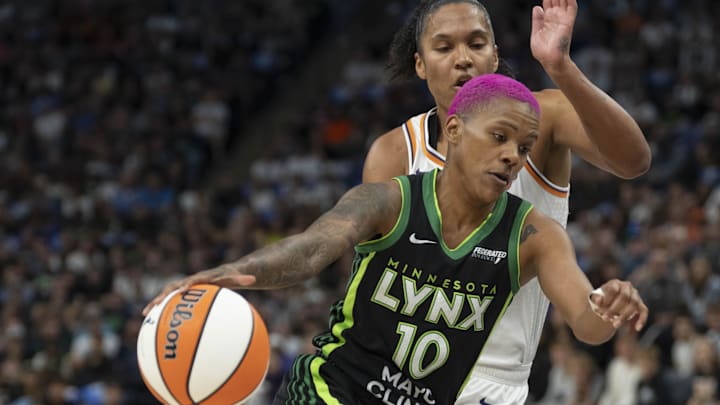 Sep 21, 2025; Minneapolis, Minnesota, USA; Minnesota Lynx guard Courtney Williams (10) dribbles the ball past Phoenix Mercury forward Alyssa Thomas (25) in the first half during game one of the second round for the 2025 WNBA Playoffs at Target Center. Mandatory Credit: Jesse Johnson-Imagn Images Sep 21, 2025; Minneapolis, Minnesota, USA; Minnesota Lynx guard Courtney Williams (10) dribbles the ball past Phoenix Mercury forward Alyssa Thomas (25) in the first half during game one of the second round for the 2025 WNBA Playoffs at Target Center. Mandatory Credit: Jesse Johnson-Imagn Images
