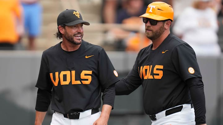 Tennessee assistant coach Ross Kivett leads Tennessee baseball head coach Tony Vitello back to the dugout after speaking with the umpire during a NCAA baseball game between the Tennessee Volunteers and Vanderbilt Commodores at Lindsey Nelson Stadium on May 11, 2025.