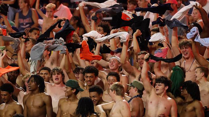 Sep 11, 2026; Charlottesville, Virginia, USA; Virginia Cavaliers fans cheer during the fourth quarter against the Norfolk State Spartans at Scott Stadium. Mandatory Credit: Amber Searls-Imagn Images Sep 11, 2026; Charlottesville, Virginia, USA; Virginia Cavaliers fans cheer during the fourth quarter against the Norfolk State Spartans at Scott Stadium. Mandatory Credit: Amber Searls-Imagn Images