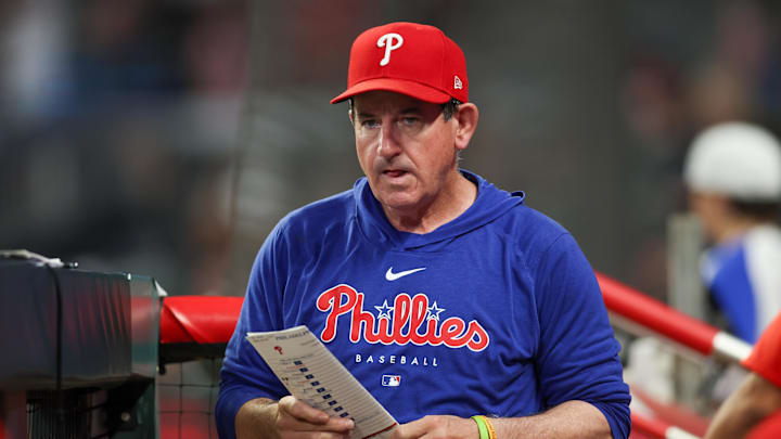Aug 21, 2024; Atlanta, Georgia, USA; Philadelphia Phillies manager Rob Thomson (59) in the dugout against the Atlanta Braves in the sixth inning at Truist Park. Mandatory Credit: Brett Davis-Imagn Images