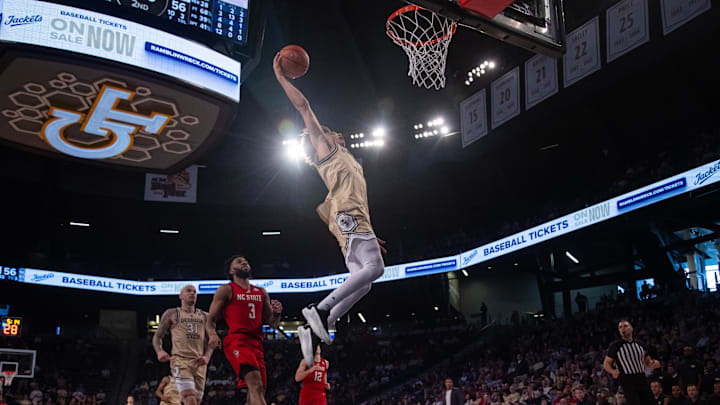 Mar 1, 2025; Atlanta, Georgia, USA; Georgia Tech Yellow Jackets guard Naithan George (1) attempts a dunk against the North Carolina State Wolfpack in the second half at McCamish Pavilion. Mandatory Credit: Brett Davis-Imagn Images