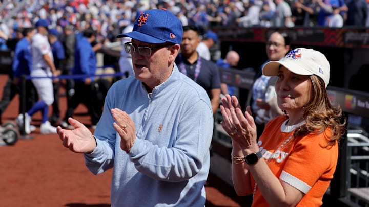 Mar 26, 2026; New York City, New York, USA; New York Mets owners Steve and Alex Cohen clap during introductions before an opening day game against the Pittsburgh Pirates at Citi Field. Mandatory Credit: Brad Penner-Imagn Images