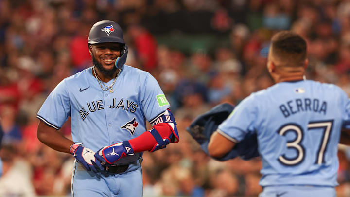 Jun 24, 2024; Boston, Massachusetts, USA; Toronto Blue Jays first baseman Vladimir Guerrero (27) celebrates after hitting a three run home run during the seventh inning against the Boston Red Sox at Fenway Park. Mandatory Credit: Paul Rutherford-Imagn Images Jun 24, 2024; Boston, Massachusetts, USA; Toronto Blue Jays first baseman Vladimir Guerrero (27) celebrates after hitting a three run home run during the seventh inning against the Boston Red Sox at Fenway Park. Mandatory Credit: Paul Rutherford-Imagn Images
