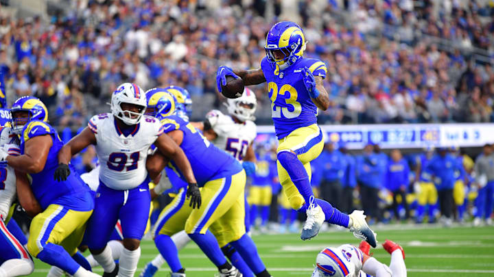 Dec 8, 2024; Inglewood, California, USA; Los Angeles Rams running back Kyren Williams (23) scores a touchdown against the Buffalo Bills during the first half at SoFi Stadium. Mandatory Credit: Gary A. Vasquez-Imagn Images