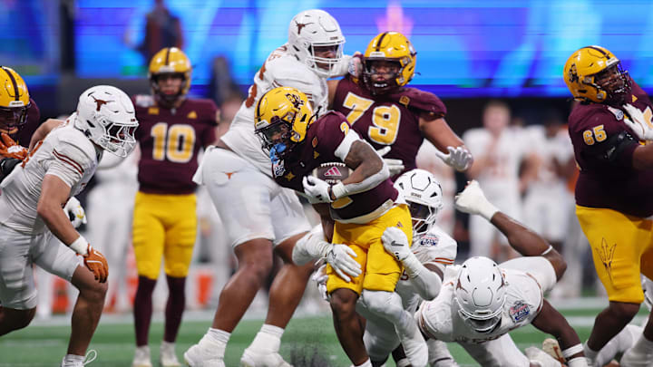 Jan 1, 2025; Atlanta, GA, USA; Arizona State Sun Devils running back Kyson Brown (2) runs with the ball against the Texas Longhorns during the second half of the Peach Bowl at Mercedes-Benz Stadium. Mandatory Credit: Brett Davis-Imagn Images