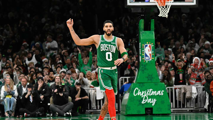 Dec 25, 2024; Boston, Massachusetts, USA; Boston Celtics forward Jayson Tatum (0) react to game action during the second half against the Philadelphia 76ers at TD Garden. Mandatory Credit: Eric Canha-Imagn Images