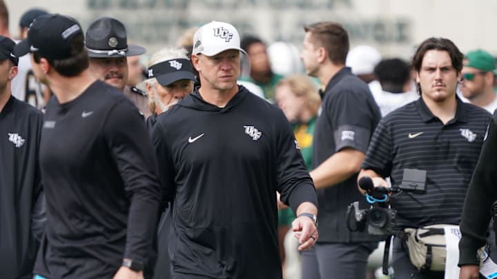 Nov 1, 2025; Waco, Texas, USA; UCF Knights head coach Scott Frost leaves the field following the game against the Baylor Bears at McLane Stadium. Mandatory Credit: Raymond Carlin III-Imagn Images Nov 1, 2025; Waco, Texas, USA; UCF Knights head coach Scott Frost leaves the field following the game against the Baylor Bears at McLane Stadium. Mandatory Credit: Raymond Carlin III-Imagn Images