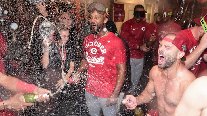 Sep 28, 2025; Milwaukee, Wisconsin, USA; Cincinnati Reds players celebrate after clinching a wild card spot after the game against the Milwaukee Brewers at American Family Field. Mandatory Credit: Benny Sieu-Imagn Images Sep 28, 2025; Milwaukee, Wisconsin, USA; Cincinnati Reds players celebrate after clinching a wild card spot after the game against the Milwaukee Brewers at American Family Field. Mandatory Credit: Benny Sieu-Imagn Images