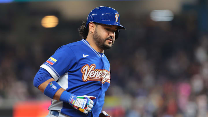Mar 16, 2026; Miami, FL, United States; Venezuela third baseman Eugenio Suárez (7) rounds the bases after hitting a solo home run against Italy in the fourth inning during a semifinal game of the 2026 World Baseball Classic at loanDepot Park. Mandatory Credit: Sam Navarro-Imagn Images