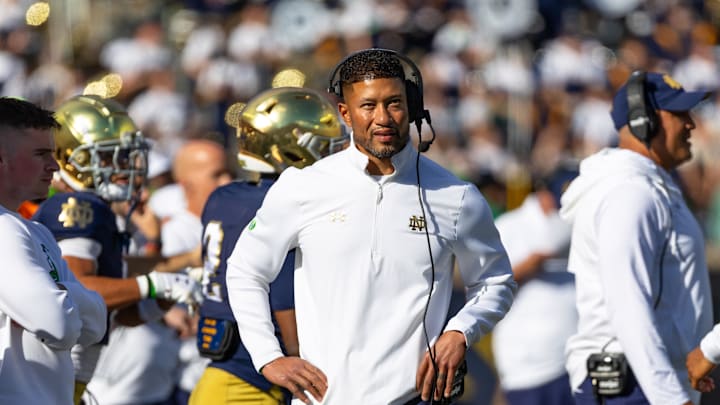 Oct 11, 2025; South Bend, Indiana, USA; Notre Dame Fighting Irish head coach Marcus Freeman looks to the scoreboard against the NC State Wolfpack during the first half at Notre Dame Stadium. Mandatory Credit: Michael Caterina-Imagn Images