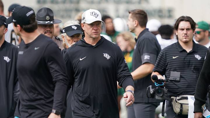 Nov 1, 2025; Waco, Texas, USA; UCF Knights head coach Scott Frost leaves the field following the game against the Baylor Bears at McLane Stadium. Mandatory Credit: Raymond Carlin III-Imagn Images Nov 1, 2025; Waco, Texas, USA; UCF Knights head coach Scott Frost leaves the field following the game against the Baylor Bears at McLane Stadium. Mandatory Credit: Raymond Carlin III-Imagn Images