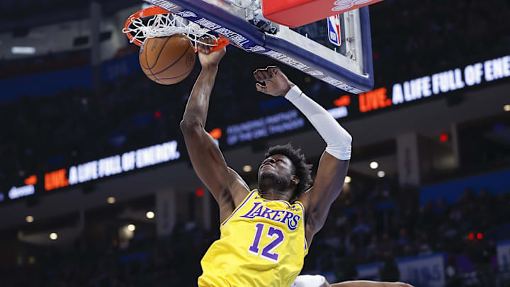 Mar 1, 2023; Oklahoma City, Oklahoma, USA; Los Angeles Lakers center Mo Bamba (12) dunks against the Oklahoma City Thunder during the second half at Paycom Center.  Mandatory Credit: Alonzo Adams-Imagn Images