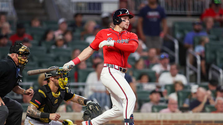 Atlanta Braves left fielder Jarred Kelenic (24) hits a single against the Pittsburgh Pirates in the sixth inning at Truist Park on June 28. Atlanta Braves left fielder Jarred Kelenic (24) hits a single against the Pittsburgh Pirates in the sixth inning at Truist Park on June 28.