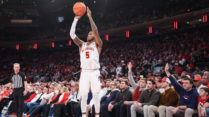 Feb 1, 2025; New York, New York, USA;  St. John's Red Storm guard Deivon Smith (5) takes a three point shot in the second half against the Providence Friars at Madison Square Garden. Mandatory Credit: Wendell Cruz-Imagn Images