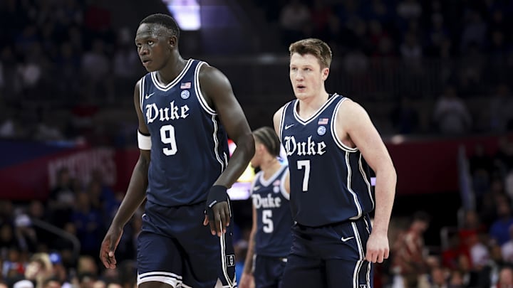 Jan 4, 2025; Dallas, Texas, USA;  Duke Blue Devils guard Kon Knueppel (7) and Duke Blue Devils center Khaman Maluach (9) during the first half against the Southern Methodist Mustangs at Moody Coliseum. Mandatory Credit: Kevin Jairaj-Imagn Images