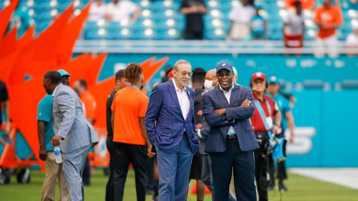 Oct 24, 2021; Miami Gardens, Florida, USA; Miami Dolphins owner Stephen Ross talks to general