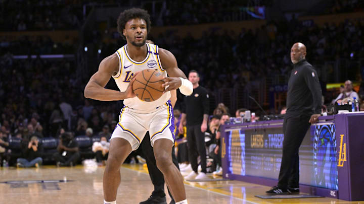 Dec 8, 2024; Los Angeles, California, USA; Los Angeles Lakers guard Bronny James (9) handles the ball in the second half against the Portland Trail Blazers at Crypto.com Arena. Mandatory Credit: Jayne Kamin-Oncea-Imagn Images Dec 8, 2024; Los Angeles, California, USA; Los Angeles Lakers guard Bronny James (9) handles the ball in the second half against the Portland Trail Blazers at Crypto.com Arena. Mandatory Credit: Jayne Kamin-Oncea-Imagn Images
