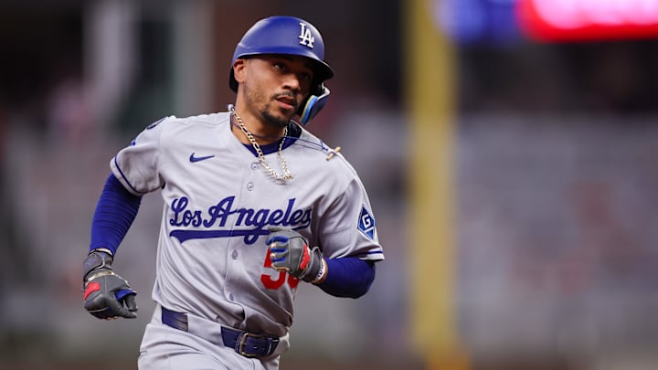 May 2, 2025; Atlanta, Georgia, USA; Los Angeles Dodgers shortstop Mookie Betts (50) rounds the bases after a home run against the Atlanta Braves in the sixth inning at Truist Park. Mandatory Credit: Brett Davis-Imagn Images