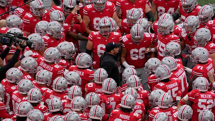 Ohio State coach Ryan Day huddles with his players before facing Maryland. Ohio State coach Ryan Day huddles with his players before facing Maryland.