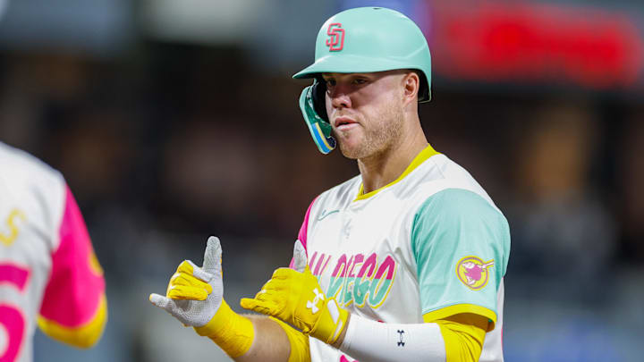 San Diego Padres left fielder Gavin Sheets (30) celebrates after hitting a single.