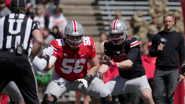April 13, 2024; Columbus, Ohio, USA; 
Ohio State Buckeyes center Seth McLaughlin (56) blocks for quarterback Will Howard (18) after the snap during the first half of the LifeSports spring football game at Ohio Stadium on Saturday.