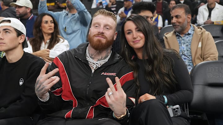  Las Vegas Raiders star Maxx Crosby and wife Rachel Washburn at a game between the Golden State Warriors and the LA Clippers 