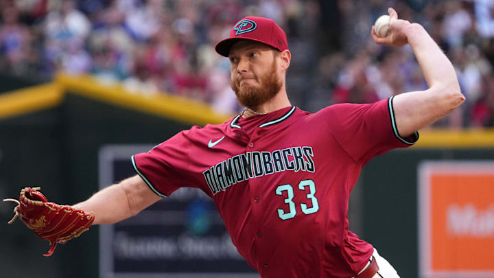 Arizona Diamondbacks left-hander A.J. Puk (33) pitches against the Chicago Cubs at Chase Field in Phoenix on Sunday, March 30, 2025.